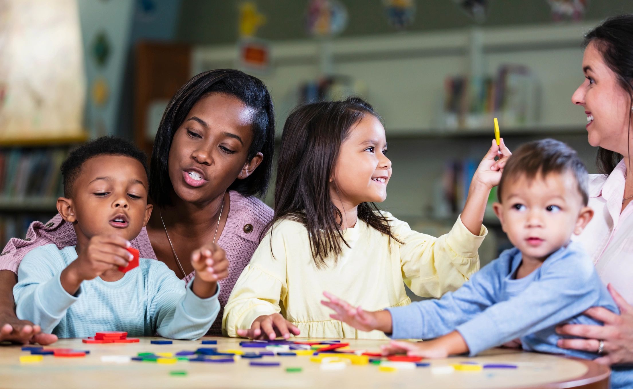 Parents and young children participating in a learning activity